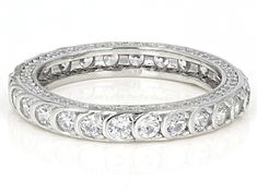 Bella Luce ® white diamond simulant 3.09ctw round, rhodium over sterling silver ring. Measures approximately 0.94"L x 0.13"W and is not sizable. Dazzling Round Platinum Eternity Band, Oval Cubic Zirconia Stackable Rings With Prong Setting, Classic Silver Eternity Band With Diamond Accents, White Round Diamond Cut Eternity Band, Platinum Eternity Band Fine Jewelry, Vs Clarity Stackable Rings Fine Jewelry, Platinum Channel Set Round Cut Jewelry, Round Eternity Band With Diamond Cut Cubic Zirconia, Channel Set Round Eternity Band Fine Jewelry