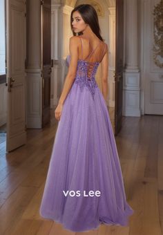 Expertly designed with exquisite appliques and sparkling purple glitter, this A-line Quinceanera dress is the perfect choice for any formal occasion. The delicate spaghetti straps and lace-up back create a flattering silhouette, while the intricate details add a touch of elegance. Turn heads and make a statement in this stunning dress. Lavender Party Gown With Sweetheart Neckline, Purple Sequin Dress For Debutante Ball, Purple Sequined Gown For Debutante Ball, Purple Embellished Dress For Debutante Ball, Embellished Purple Dress For Debutante Ball, Purple Gala Dress With Corset Back, Purple Dress With Corset Back For Gala, Purple Corset-back Dress For Gala, Purple Corset Back Dress For Gala