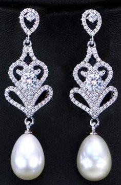 "PAIR SILVER Water-Drop Pearl Crystal Long Earrings Elegant Bridal Wedding Gauges Plugs 6g 4g 2g 4mm 5mm 6mm Length: 2\" FOR GAUGES/STRETCHED EARLOBES: All styles come with internally threaded (screw on/off) double flare tunnels. You also have the option to add an o-ring (for $1) that can be worn with the screw on/off flares for extra security that can help with possible sagging, or by themselves without the screw on/off flares making it a single flare. REGULAR POSTS/EARRINGS (not gauges for str White Pear-shaped Chandelier Earrings For Gift, Teardrop Jewelry With Bail For Wedding, Wedding Gauges, Gauges Earrings, Stretched Ear Lobes, Stretched Ear, Formal Earrings, Silver Water, Bride Earrings