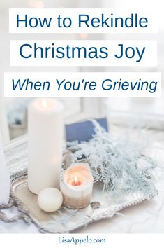 a white candle sitting on top of a table next to a christmas decoration with the words, how to re kindle christmas joy when you're giving