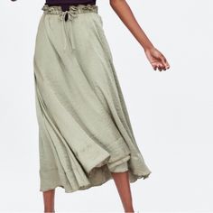 Zara Sage Satin Sage Midi Skirt With Tie Front Size Small Sage Olive Color Never Worn Elastic Scrunched Waist Tie Maxi Skirt Longer Is Back That Front 100% Polyester Lined Super Flowy Spring Viscose Skirt With Elastic Waistband, Spring Skirt With Elastic Waistband In Viscose, Viscose Skirt With Elastic Waistband For Spring, Viscose Skirt For Day Out, Versatile Solid Maxi Skirt For Spring, Spring Viscose Flared Skirt, Spring Viscose Long Skirt, Spring Viscose Skirt, Spring Long Viscose Skirt