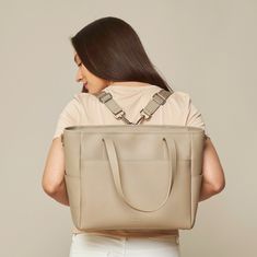 This structured tote is the ultimate do-it-all bag that you deserve. It's the perfect carryall for work, travel, and anywhere your day brings you. It features a spacious and organized interior for your essentials, a padded compartment for your laptop, side pockets for your drinks, and you can convert it into a backpack or crossbody. Crafted from premium American Saffiano leather that's waterproof and scratch-resistant, the Transform Tote will stay just as beautiful through all your travels and a Purses For Travel, Professional Outfit, Pear Body, Pear Body Shape, Travel Purse, Cute Purses, Work Bag, Professional Outfits, Work Travel