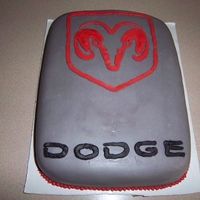 a cake made to look like the dodge logo