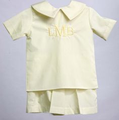 "He will look amazing in a toddler boy Easter outfit by Zuli Kids. Baby boy Easter outfit is a yellow shorts set that can be a personalized baby outfit with peter pan collar shirt. Available plain or with monogram. Other Easter outfits available here: https://www.etsy.com/shop/ZuliKids?ref=seller-platform-mcnav&section_id=19546260 Zuli Kids Premium Quality Poly Cotton Imperial Broadcloth Button Back Closures Elastic Waist Shorts WHATS INCLUDED One 2 piece shorts set. To see other similar items, Short Sleeve Tops For Summer Baptism, Cute Yellow Short Sleeve Clothing Sets, Cute Yellow Sets With Short Sleeves, Cute Yellow Set With Short Sleeves, Cute Yellow Short Sleeve Sets, Yellow Fitted Short Sleeve Set, Cotton Baptism Sets, Boys Church Outfit, Toddler Boy Easter Outfit