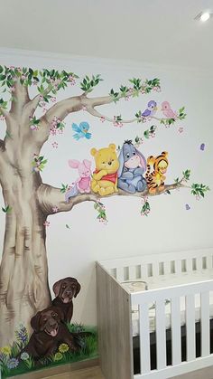 winnie the pooh wall decal in a baby's room