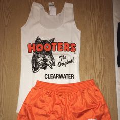 New Hooters Girl Vintage Original Uniform Shorts/Tank From The Original Hooters In Clearwater Florida. Size Tank-Xs And Shorts-Xxxs. Makes A Great Halloween Costume White Short Tank Top For Spring, White Cotton Cheerleading Bottoms, White Cheerleading Shorts For Summer, White Cotton Bottoms For Cheerleading, White Summer Cheerleading Shorts, White Summer Tank Top For Workout, White Summer Workout Tank Top, White Short Tops For Streetwear, Hooters Girl Costume