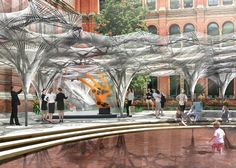 an artist's rendering of people walking around in a courtyard with trees and fountains