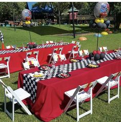 a table set up for a mickey mouse party