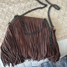 Brand New. Perfect Condition. 10 Inches High 12 Inches Long. Long Strap For Cross Body Wear. Trendy Fringe Bags For Shopping, Brown Crossbody Shoulder Bag For Party, Brown Leather Party Bag, Leather Fringe Bag For Party, Leather Fringe Party Bag, Chic Pouch Bag With Fringe Details, Chic Fringe Pouch Bag, Chic Fringed Pouch Bag, Brown Party Bag With Adjustable Strap