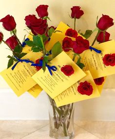 a vase filled with red roses sitting on top of a white floor next to a wall