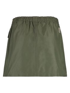 Ever wondered what it's like to wear a slice of modern luxury? This stylish skirt combines the best of comfort and flair, making it a must-have in your Moncler clothing collection. Perfect for any occasion, it's both chic and incredibly versatile. Back logo patch Adjustable drawstring elastic waistband Two front flap pockets Made from 100% polyamide, 30% cotton, 70% polyester Adventure Accessories, Green It, Luxury Sportswear, Moncler Women, Stylish Skirts, Quilt Jacket, Active Outfits, Sportswear Brand, Green Skirt