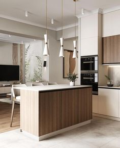 a modern kitchen with white and wood cabinets, an island countertop and pendant lights