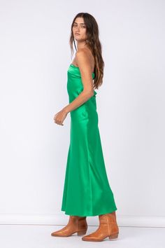 The Irene Green Satin Strapless Maxi Dress is the perfect date night dress! Green satin fabric shapes this strapless maxi dress with a cowl back and a ruched elastic strap. Pair with some gold jewelry and strappy heels for a night out on the town. DETAILS & CARE 95% Polyester/ 5% Spandex Hand wash cold. Imported. Green Satin Fabric, Green Satin Dress, The Perfect Date, Date Night Dress, Perfect Date, Strapless Maxi, Strapless Maxi Dress, Date Night Dresses, Pink Boho