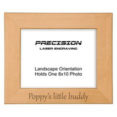 a wooden frame with the words poppy's little buddy on it and an image of a