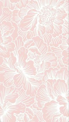 a white flower pattern on a pink background