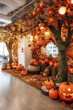 an office decorated for halloween with pumpkins and trees