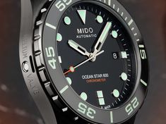 Exclusively available on TimeMachinePlus.com for the next 3 months (starting June 20, 2022). A distillation of technology inside an extraordinary Swiss diving watch, the Ocean Star 600 Chronometer is designed for exploring the ocean's depths. Water-resistant up to 60 bar (600 m / 1,968 ft), this exceptional timepiece is perfectly suited to the specific conditions of deep water: its bezel, decorated of a ceramic ring, is filled with Super-Luminova® Grade X. This sporty model is also fitted with a Mido Ocean Star, Oris Watches, Tactical Watch, Diving Watch, Cliff Diving, Ceramic Ring, Mens Watches Black, Hand Watch, Ceramic Rings