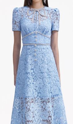 A calming vision in blue lace, this dress puts its rich floral textures on show with a universally flattering silhouette. Echo its diamanté bow with sparkling accessories at your next soirée. Main Fabric: 98% Polyester 2% Polyamide Lining: 100% PolyesterFitted style, take one size up if between sizesThis style has minimal stretchInvisible zip closure at backDiamanté trims and buttonsShort length lining Colour may vary due to lighting on images. The product images (without model) are closest to the true colour of the product.Item runs true to size chart and is cut to suit our size chart. Please refer to our size chart for the best fit. Do not size up or down. Formal Midi Dress With Delicate Lace, Evening Midi Dress With Delicate Lace, Delicate Lace Midi Dress For Formal Occasions, Elegant Midi Dress With Delicate Lace For Party, Spring Gala Midi Dress With Lace Trim, Elegant Mini Lace Dress With Lace Trim, Elegant Party Midi Dress With Delicate Lace, Chic Formal Dress With Delicate Lace, Formal Midi Lace Dress With Scalloped Lace