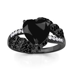 This promise ring resembles black wings encircling a black love heart main stone, symbolizing the free flight and eternal protection of love. The wings symbolize hopes and dreams, and encircling the love stone symbolizes the strong bond between you and your shared hopes for the future. Wearing this black promise ring is like having the power to guard your love and make it shine brightly in the darkness, making it the most precious wish of your heart. Let this heart wings ring bear witness to your vows and promises to be with you forever.Carat Weight: 3.1 ctStone Size: 8*8 mmStone Type: Jeulia® StoneNumber of Stones: 1 Stone Color: Fancy BlackStone Shape: HeartCarat Weight: 0.4 ctStone Size: 1.2,0.8,1 mmStone Type: Jeulia® StoneNumber of Stones: 60 Stone Color: Diamond White, Fancy BlackSto Black Heart Ring, Wings Ring, Black Love Heart, Heart Wings, Ring Bear, Heart With Wings, Black Wings, Hopes And Dreams, In The Darkness