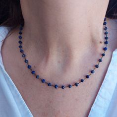 "This Lapis Lazuli necklace is a must for all jewelry lovers. This necklace goes well with any outfit, as well as being a great addition to your collection of jewelry! The natural stone makes this necklace perfect for minimalists or those who like simple elegance. This necklace is made from beautiful Lapiz Lazuli beads linked together with oxidized silver chains. This piece of jewelry comes wrapped in a nice package and is ready to be given as a gift. ❤ 𝗠𝗘𝗔𝗦𝗨𝗥𝗘𝗠𝗘𝗡𝗧𝗦❤ Lapis width: 0.1 Single Strand Lapis Lazuli Beaded Necklace As Gift, Lapis Lazuli Beaded Necklaces For Gift, Handmade Lapis Lazuli Necklaces, Adjustable Single Strand Lapis Lazuli Necklace, Adjustable Sapphire Beaded Necklace Gift, Sapphire Beaded Necklace As Gift, Blue Wire Wrapped Briolette Necklaces, Blue Briolette Wire Wrapped Necklaces, Sapphire Colored Lapis Lazuli Single Strand Necklace