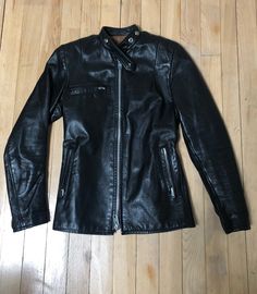 Small Vintage 1960s Black Brimaco Cafe Racer Motorcycle Biker Mod Leather Jacket, Acme Zips- Near Mint! Are you a mod or a rocker? It doesn't matter. This jacket is too amazing! Near mint, in excellent vintage condition. Probably an XS, please be sure to check the measurements listed for a good fit. All measurements taken with the jacket laying flat. Shoulder to shoulder: 14 inches Pit to pit: 16 inches Bottom of jacket: 17 inches Sleeve length: 23 inches Neck to hem: 24.5 inches Please feel fre Retro Biker Jacket With Zipper For Biker Events, Retro Leather Jacket With Zipper For Biker Events, Retro Biker Jacket With Zipper Closure, Vintage Black Leather Jacket With Front Zip, Vintage Leather Jacket With Zip Fly, Vintage Leather Jacket With Zipper, Vintage Black Outerwear With Zipper Closure, Vintage Leather Jacket With Zipper Closure, Vintage Biker Jacket With Zipper Closure