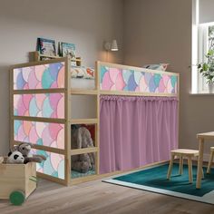 a child's room with a bunk bed, table and chairs