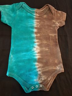 Very cool vibrant contrast of teal and brown. Side by side tie-dye effect gives an edgy look. size 18 months. 100% cotton. Soft and comfortable for babies soft skin. Bodysuits washed in Dreft newborn detergent and colors set. Girl Swinging, Teal And Brown, Baby Soft Skin, Brown Tie, Gender Neutral Baby Clothes, Soft Skin, Edgy Look, Gender Neutral Baby, Side By Side