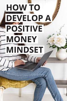 a woman sitting on a chair with her laptop in front of her and the words how to develop a positive money mindset