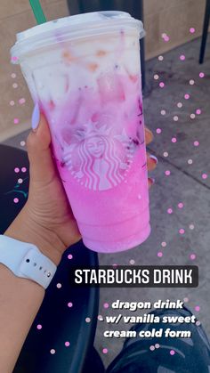 someone holding up a pink drink in their hand with the caption starbucks drink dragon sweet ice cream cold form