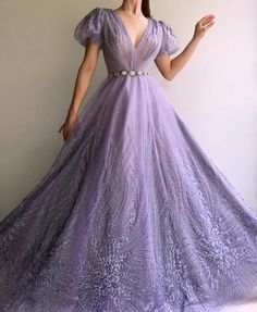 Dreamy Purple TMD Gown – Teuta Matoshi Purple Tulle Evening Dress For Banquet, Purple Gown For Prom Season, Purple Fitted Ball Gown For Prom, Purple Fitted Ball Gown For Prom Season, Purple Tulle Gown For Banquet, Purple Fitted Floor-length Ball Gown, Purple Floor-length Ball Gown With Sweep Train, Purple Evening Dress With Sweep Train For Prom, Purple Gown With Fitted Bodice For Prom