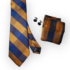 Introducing the Gold Blue Striped Silk Tie Pocket Square Cufflink Set, the perfect addition to any formal occasion. Made with high quality silk, this set exudes sophistication and class. The gold and blue striped pattern adds a touch of elegance to any outfit, making it the perfect choice for weddings, business meetings, and other formal events. 100% Silk Handmade Package Includes: Tie, Pocket Square & Cufflinks. Length: 59" Width: 3.34" Warm iron if needed Elegant Blue Cufflinks For Business, Gold Suit And Tie Accessories For Business, Blue Cufflinks For Business And Father's Day, Luxury Blue Suit And Tie Accessories For Office, Classic Blue Cufflinks For Office, Gold Cufflinks For Black Tie Events, Elegant Blue Cufflinks For Formal Occasions, Elegant Gold Cufflinks For Office, Unique Ties