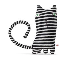 a black and white striped cat with green eyes on it's head is shown