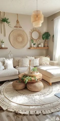 a living room filled with lots of white furniture