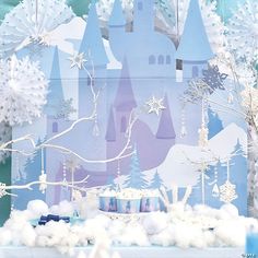 an image of a frozen princess birthday party scene with castle and snowflakes on display