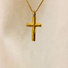 MELIGreece's charming cross pendant in yellow gold 18k with a long yellow gold 14k chain. Orthodox baptism cross necklace made with the hammered technique in our workshop in Athens, Greece. Dimensions of the cross pendant: 2.5 * 1. 5 cm / 0.98 * 0.59 inch. (Nonadjustable) Necklace (chain) length: 40.0 cm / 15.7 inch. This hammered yellow gold 18k cross is the perfect choice for an Orthodox baptism. On another case this solid gold cross necklace is the timeless choice for a bridal minimal jewelry Gold Long Chain, Gold Pendant Jewelry, Necklace Bridal, Gold Cross Necklace, Unisex Necklace, Yellow Gold Jewelry, Necklace Chain Lengths, Minimal Jewelry, Gold Cross