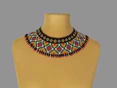 "It is a dainty bead necklace pairs well with casual wear or evening dresses. Modern beaded jewelry will decorate any look. If you want your jewelry to last as long as possible, avoid water and dust. This necklace is crafted with Czech beads and durable nylon threads. The total length of the necklace is 43cm (16.93\"), the width is 7.5cm (2.75\"). The length of the necklace is not adjustable. Important Information: -Please make sure your address is entered correctly. -Taxes, duties and charges a Bohemian Bib Necklace With Black Beads For Gifts, Bohemian Bib Necklace With Black Beads As Gift, Bohemian Black Beads Bib Necklace As Gift, Bohemian Black Beaded Bib Necklaces As Gift, Bohemian Black Beaded Bib Necklace As Gift, Colorful Beads Choker Bib Necklaces, Gift Colorful Beads Bib Necklace, Gift Bib Necklaces With Colorful Round Beads, Gift Bib Necklace With Colorful Round Beads