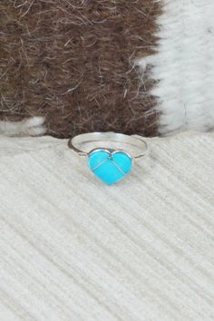 This turquoise and sterling silver inlay heart ring was made by Zuni silversmith Linda Chavez.Size: 6.25Length: 1/4"Width: 3/8"Free shipping on all orders! We ship with USPS and always include tracking. All orders ship within a day of payment.Returns are accepted up to 30 days after you receive your order. Just send us a message. Our shop offers cash back or store credit. The item must be returned in new condition. Heart-shaped Turquoise Blue Ring For Gift, Heart-shaped Blue Turquoise Ring For Gift, Heart-shaped Blue Turquoise Ring Gift, Heart-shaped Turquoise Sterling Silver Ring, Heart-shaped Turquoise Ring As Gift, Handmade Turquoise Heart-shaped Ring, Handmade Turquoise Heart Ring, Handmade Heart-shaped Turquoise Ring, Turquoise Heart Ring In Sterling Silver As Gift