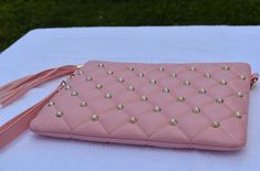 This pearl clutch is beyond classy and chic. Perfect for everyday use and any occasion. Fits your phone, lipstick, cash, keys, and cards with ease. A versatile clutch that Includes a removable wrist strap and removable/adjustable shoulder strap. Width 11.5 in * 8.5 in height. Pearl Clutch, Coach Dinky Crossbody, Wrist Strap, Convertible, Shoulder Strap