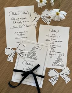 the wedding stationery is laid out and ready to be put into the guests'bags