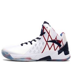 a white and blue basketball shoe with red, black, and blue accents on the sole