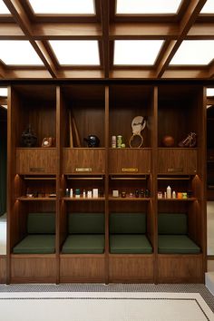 a wooden shelf filled with lots of different items