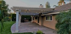 an outdoor patio with lights on the roof