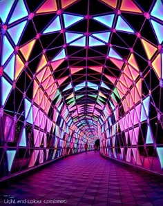 the inside of a building with colorful lights