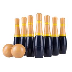 an assortment of wooden bowling pins and eggs