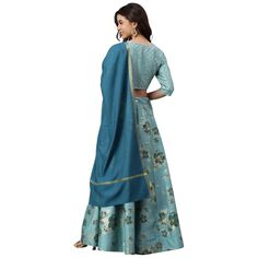 This Statement Piece Lehenga Set for Women exudes luxury and elegance, with a timelessly classic combination of green and gold. Featuring a silk ehenga with decorative border, a silk blouse with floral and gold and a matching dupatta, this set is finished with a perfect touch of refined luxury. ﻿ Please size up for a comfortable fit ! This lehenga set is a perfect ensemble for a wedding guest or a formal event. Product Details: Lehenga Choli With Dupatta COLOR: Blue FABRIC: Poly Silk PATTERN: Fl Indian Wedding Wear, Silk Lehenga, Decorative Borders, Lehenga Choli, Wedding Wear, Silk Blouse, Blue Fabric, Formal Event, Half Sleeves