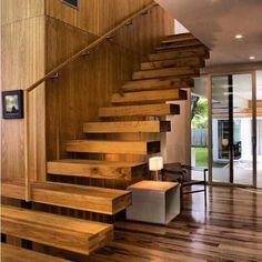 there is a wooden stair case in the house