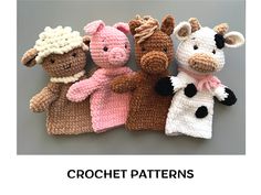 four crocheted stuffed animals sitting next to each other