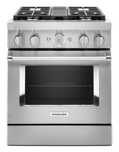 a stainless steel oven with four burners on the front and two side doors open