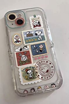 an iphone case with some stickers on it