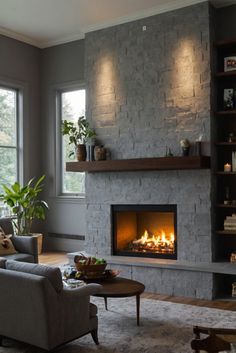 fireplace materials, fireplace designs, fireplace materials pros and cons, living room fireplace, fireplace design ideas, heat-resistant fireplace materials, fireplace safety features Dark Stone Fireplace, Halcyon Green, Grey Stone Fireplace, Light Oak Floors, Living Room Marble, Green Painted Walls, Light Colored Furniture, Dining Room Fireplace